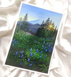 a painting of bluebells in the mountains on a white bed sheet with pine trees