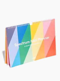 a colorful calendar with the words spectum mini planner on it