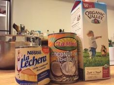 an assortment of food items sitting on a counter in front of a milk carton