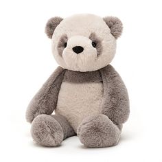 a gray and white teddy bear with a scarf around it's neck sitting down