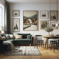 a living room filled with furniture and pictures on the wall