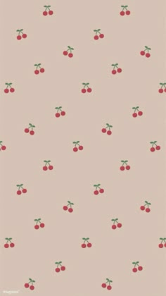 a wallpaper with cherries on it in red and green, against a light pink background