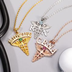 Font:Birthstone:Celebrate Graduation - The perfect graduation gift. Give it to your son, relative, friend, or yourself who just graduated from the medical profession.Express Admiration and Gratitude - Customize your charm with beautiful gemstones. And you also can customize proprietary initials or occupation abbreviations.Express the Love of Profession - The necklace pendant adopts a snake caduceus element, which is not only a symbol of the god of medicine but also a symbol of the profession of Personalized Silver Necklace For Graduation, Personalized Silver Necklace For Graduation Gift, Personalized Jewelry For Graduation And Mother's Day, Silver Jewelry For Graduation And Mother's Day, God Of Medicine, Doctor Jewelry, Medical Theme, Medical Profession, Just Graduated