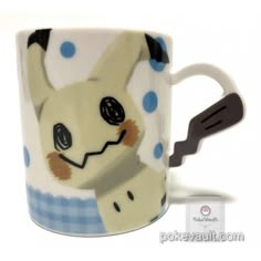 a coffee cup with a rabbit on it