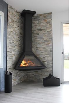 a fireplace in the corner of a living room