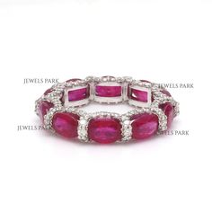 Real ruby diamond oval eternity band ring gold | Natural big oval ruby eternity band ring | Ruby ring gold | Ruby birthstone ring GEMSTONE DETAILS : ✦ Gemstone : Ruby ✦ Gemstone Type : Natural ✦ Gemstone Size : 6x4 MM ✦ Gemstone Shape : Oval ✦ Number of Gemstones : 10 ✦ Gemstone Weight : 5-6 carats ✦ Gemstone Grade : AAA DIAMOND DETAILS : ✦ Diamond Type : Natural ✦ Diamond Size : 1.00 mm ✦ Diamond Color : F-G ✦ Diamond Clarity : Slightly included ✦ Diamond Cut : Excellent - Very Good ✦ Diamond Weight : 0.65 Carats METAL DETAILS : ✦ Metal : 14K/18K Gold ✦ Metal Color : Yellow / White / Rose Gold ✦ Setting : Shared Prong Setting ✦ Ring Box : Yes SHIPPING DETAILS : ✦ Shipped via : UPS ✦ Production time : 10-12 days ✦ Delivery time : 7-8 days ✦ Expedited shipping : Available ✦ Expedited shippi Oval Eternity Band, Ruby Birthstone Ring, Ruby Eternity Band, Ruby Bands, Ruby Ring Gold, Eternity Ring Gold, Rainbow Sapphires, Ruby Birthstone, Ring Ruby