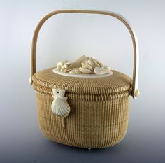 a wicker basket with shells in it