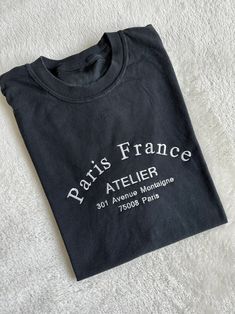 Paris France Atelier Shirt. Made with high quality embroidered design. Material: 100% Cotton, T-Shirt is Cotton/Jersey Light Stretch Fit: SEE SIZE CHART Shirts are Unisex MEN: Order Regular Size WOMAN: Order 1 Size down for tighter fit Care: Machine wash cold Tumble Dry low Paris T Shirt Design, Black Cotton T-shirt With Letter Embroidery, Trendy Crew Neck T-shirt With Letter Embroidery, Trendy Cotton T-shirt With Embroidered Logo, Shirt With Embroidery, Paris Atelier, Paris Shirt, Paris T Shirt, Paris Aesthetic