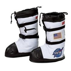 pair of white and black boots with nasa patches on the side, one has an american flag patch