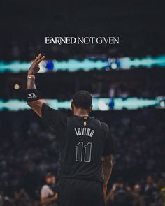 a basketball player raising his arms in the air with an inscription above him that reads, earning not given