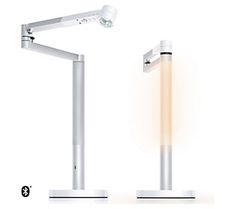 an image of a white desk lamp that is on top of a stand with the light turned off