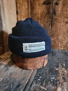 Our take on the classic USN watch cap, 100% wool and made in the USA.  One size fits all. We lovingly hand pick every vintage item for its age, uniqueness, coolness and style.  Hope you like our finds. All of our items are vintage and may show signs of previous wear. Any significant wear, damage or marks will be photographed however we love a bit sunfade and a vintage repair, they just add character for us. We have a store in Brighton and you can also follow us on Instagram to keep up with our latest finds @salvageandsawdustco Vintage Fitted Hats For Outdoor, Vintage Fitted Outdoor Hat, Navy Flat Cap For Winter, Classic Navy Hat For Outdoor, Fitted Cotton Hats For Cold Weather, Navy Curved Brim Hat For Winter, Fitted Cotton Hat For Cold Weather, Classic Navy Outdoor Hat, Outdoor Cap Made In Usa