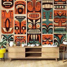 the wallpaper in this room is made up of native american art and features totems