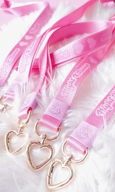 This lanyards features a cute gold heart clip  Woven repeat Nightkitsune Logo  Faux Leather Logo detailing  20 mm X 920 mm Pink Lanyard, Car Accessories Gifts, Cute Lanyards, Heart Clip, Pastel Girl, Cosplay Tips, Crochet Bags Purses, Cute Stationery, Car Girls