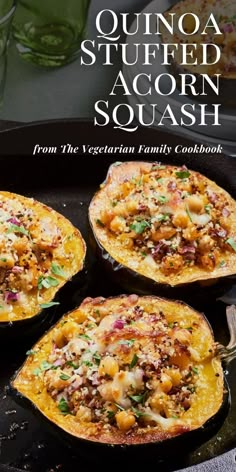 three stuffed acorn squash in a cast iron skillet with the title, quinoa stuffed acorn squash from the vegetarian family cookbook