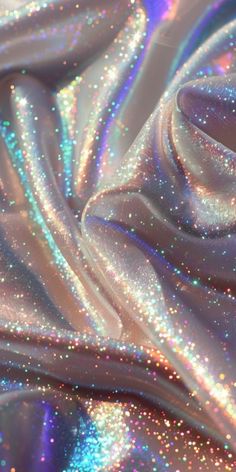 the fabric is shiny and has many small glitters on it's surface,