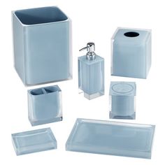 a bathroom accessory set including soap dispenser, toothbrush holder and tissue dispenser