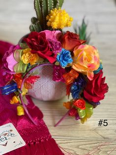 a bouquet of colorful flowers sitting on top of a table