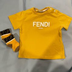 Fendi Shirt And Socks, Size 6 Months. Work Twice, In Pristine Condition. I Am Selling As A Combo. If You’re Interested In Purchasing Only One Of These Items Please Let Me Know! Fendi Shirt, Let Me Know, Kids Shirts, 6 Months, Shirts Tops, Kids Shop, Fendi, Let Me, Socks