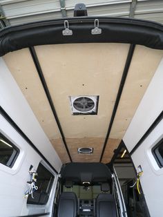 the inside of a van with its doors open