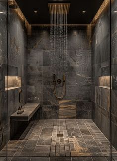 a walk in shower sitting inside of a bathroom next to a tiled floor and walls