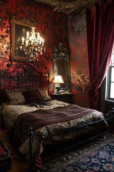 a bed in a room with red wallpaper and chandelier hanging from the ceiling