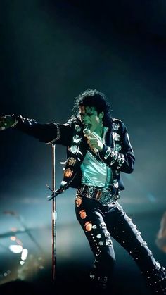 michael jackson performing on stage at a concert