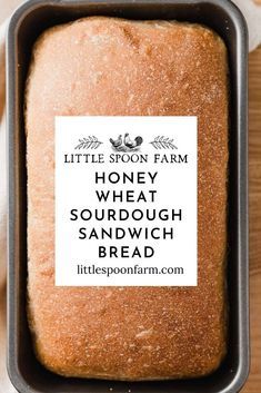 a loaf of sourdough bread in a pan with the words little spoon farm on it