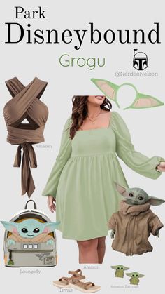 a woman in a green dress and baby yoda costume