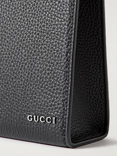 Gucci's pouch has been made in Italy from full-grain leather and discreetly detailed with a silver-tone logo. It opens to a canvas-lined interior with handy slip pockets to organise your essentials. Classic Black Leather Pouch, Black Gucci Bag With Removable Pouch, Gucci Black Formal Wallet, Black Gucci Pouch Bag, Luxury Leather Pouch With Gold-tone Hardware, Gucci Pouch, Gucci Collection, Gucci Accessories, Leather Pouch