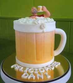 a birthday cake made to look like a beer mug