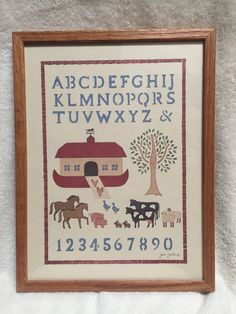 a cross stitch pattern with farm animals on it and the words abcdefghj, klmnopo's, twyz & x