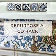 the words repurpose a cd rack are in front of an ornate wallpaper