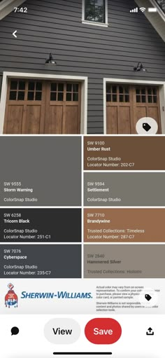 the color scheme for this house is gray and brown, with two garage doors on each side