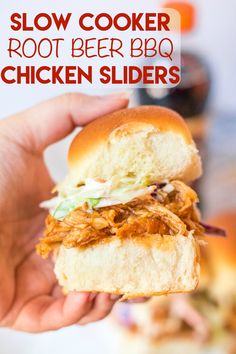 a hand holding a pulled pork bbq chicken slider with the text slow cooker root beer bbq chicken sliders