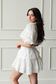 A classic white two piece, our Kent ruffle skirt set is cut from 100% cotton, adorned with inset panels of decorative floral embroidery. The slip-on ruffle mini skirt has an elasticized waist-band, while the crop top features blouson shoulders, button down styling and is finished with fun and flirty tassels. We love the versatility of both pieces. Button Down Styling, White Ruffle Skirt, White Two Piece, Ruffle Mini Skirt, Ruffle Skirt, Classic White, Floral Embroidery, Puff Sleeve, Skirt Set