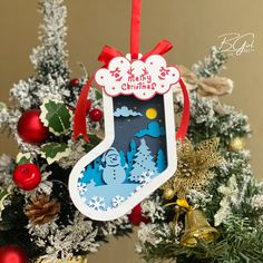 an ornament hanging from a christmas tree