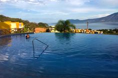 an empty swimming pool with people in it