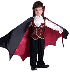 a young boy dressed up as a vampire