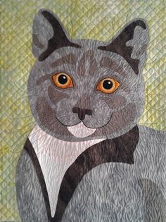 a painting of a grey cat with orange eyes and a black bow tie on it's chest