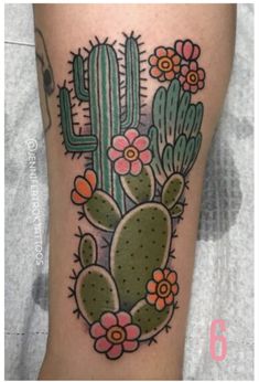 a cactus with flowers on it's thigh is shown in this tattoo design by person