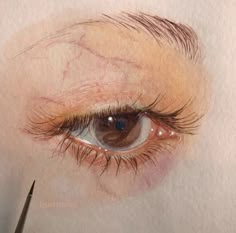 a drawing of an eye with watercolor pencils