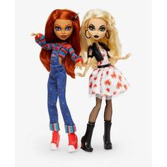 two dolls standing next to each other in front of a white background and one is holding her hand out