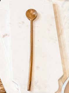 A hand carved acacia wood spoon with an extra long handle. Perfect for mixing drinks, or serving sauces. Each spoon is hand carved and will have slight variations and imperfections due to their hand carved nature. measures approximately 12 inches long with a 1.5 inch diameter spoon. Mixing Drinks, Wood Spoon, Eco Friendly House, Gift Card Sale, Mixed Drinks, Long Handles, Acacia Wood, Fragrance Candle, Extra Long