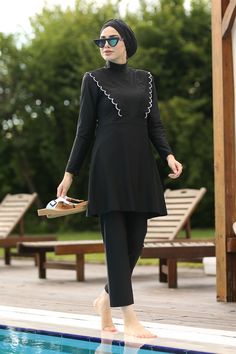 Dark Angel Burkini Swimsuit is suitable for those who want to wear Muslim swimwear. The product has made with high-quality fabrics. It doesn't limit your movement while swimming and it dries really fast. Islamic Swimwear, Burkini Swimsuit, Muslim Swimwear, Women Swimsuit, Modesty Fashion, Long Sleeve Swimsuit, Modest Swimwear, Swimming Suit, Swimwear Women