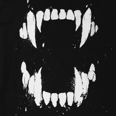 a black shirt with white teeth on it