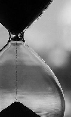 black and white photograph of an hourglass