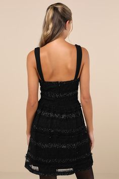 You'll be everyone's top crush in the Lulus Coveted Choice Black Mesh Ruched Mini Dress! Stretchy mesh fabric shapes this stunning little dress that boasts a textured, ruched effect, with ruffled details, sequins, and sparkly Lurex throughout. Sweetheart-style bustier bodice is supported by wide straps and has padded cups with supportive underwire. Fitted waist tops a flaring skirt that ends at a mini hem. Hidden zipper/clasp at back. Fit: This garment fits true to size. Length: Mid-thigh. Size medium measures 27.5" from shoulder to hem. Bust: Great for any cup size. Waist: Fitted - very fitted at natural waist. Hip: Not Fitted - fuller skirt allows room for hips. Undergarments: Padded cups - May be worn with an adhesive bra, petals, or no bra. Fabric: Fabric is very stretchy. Lined. Shell Elegant Black Mini Mesh Dress, Spring Mini Mesh Dress With Ruched Detail, Flirty Black Mini Mesh Dress, Black Sleeveless Mesh Mini Dress, Dress With Bustier, Black Mini Dress With Built-in Bra And Stretch, Mesh Mini Dress, Ruched Mini Dress, Adhesive Bra