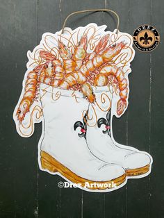 a sticker depicting a boot with shrimp in it