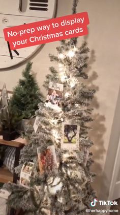 a small christmas tree with pictures on it and the words no - prep way to display your christmas cards